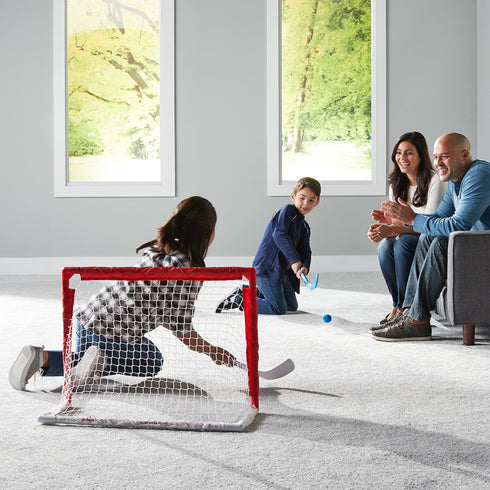 Franklin Sports NHL Kids Mini Hockey Set - Includes 1 Knee Hockey Goal - 2 Mini Hockey Sticks + 2 Foam Balls