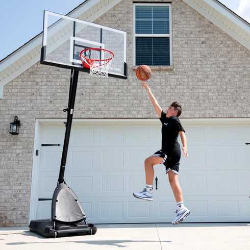 Spalding 54 In. Shatter-proof Polycarbonate Exacta height® Portable Basketball Hoop System