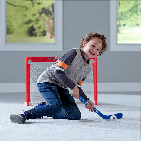 Franklin Sports NHL Kids Mini Hockey Set - Includes 1 Knee Hockey Goal - 2 Mini Hockey Sticks + 2 Foam Balls