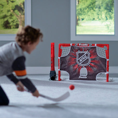 Franklin Sports Knee Hockey Goal Set - Mini Hockey Stick Set - Automatic Ball Passer, Goal & Target Set